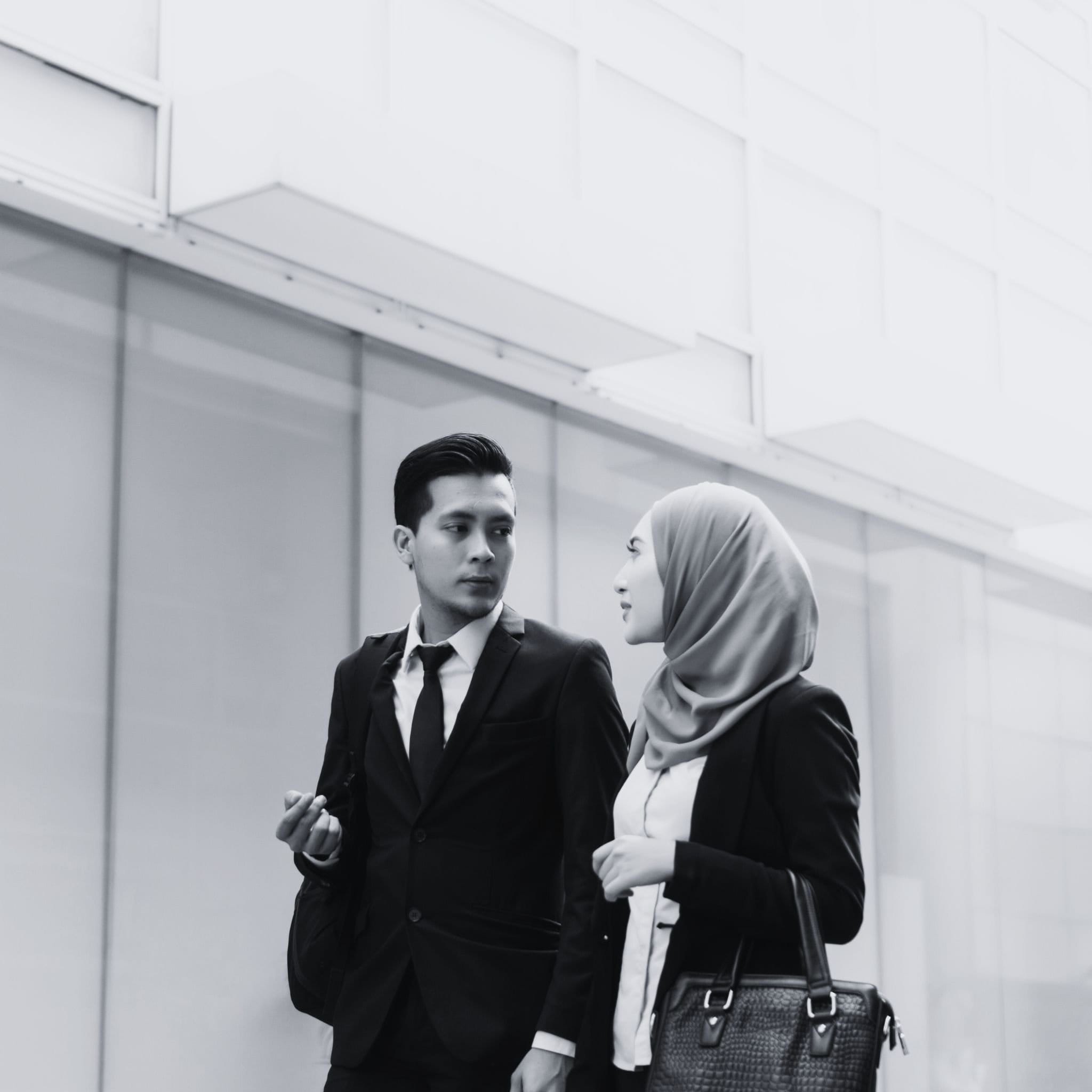 Two colleagues in conversation
